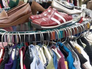 Used clothes and shoes at a secondhand consignment shop